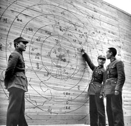 China: Chinese Nationalist Army officers study a map of Chongqing (Chungking) and the surrounding region during the Second Sino-Japanese War, Chongqing, March 1939 The Second Sino-Japanese War (July 7, 1937 September 9, 1945) was a military conflict fought primarily between the Republic of China and the Empire of Japan. After the Japanese attack on Pearl Harbor, the war merged into the greater conflict of World War II as a major front of what is broadly known as the Pacific War.<br ><br > Although the two countries had fought intermittently since 1931, total war started in earnest in 1937 and ended only with the surrender of Japan in 1945. The war was the result of a decades-long Japanese imperialist policy aiming to dominate China pol Copyright: xxPicturesxFromxHistoryx