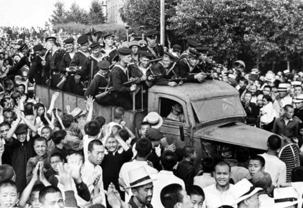 China USSR: Chinese residents of the city of Harbin welcome Soviet liberators from Japanese occupation, August 1945 Chinese residents of the city of Harbin welcome Soviet sailors of the Amur Military Flotilla, 1st Brigade following the Manchurian Strategic Offensive Operation.<br ><br > The campaign began on 9 August 1945, with the Soviet and Mongolian invasion of the Japanese puppet state of Manchukuo in northeastern China and was the largest campaign of the 1945 Soviet-Japanese War, which resumed hostilities between the Soviet Union and the Empire of Japan after almost six years of peace.<br ><br > The rapid defeat of Japan™s Kwantung Army has been argued to be a significant factor in the Japanese surrender and the end of World Wa Copyright: xxPicturesxFromxHistoryx