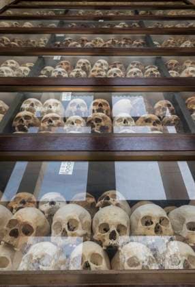 Cambodia: Layers of skulls of victims killed by the Khmer Rouge in the Memorial Stupa of Choeung Ek Genocidal Center, south of Phnom Penh (2016) About 12 km (7½ miles) south of Phnom Penh lie the infamous Killing Fields of Choeung Ek. Here victims of the Khmer Rouge, including many from Tuol Sleng, were taken for execution and burial in mass graves. Many of these have now been exhumed, and a stupa-shaped mausoleum has been erected to their memory.<br ><br > The Khmer Rouge, or Communist Party of Kampuchea, ruled Cambodia from 1975 to 1979, led by Pol Pot, Nuon Chea, Ieng Sary, Son Sen and Khieu Samphan. It is remembered primarily for its brutality and policy of social engineering which resulted in millions of deaths. Its attempts at agric Copyright: xOliverxHargreavexOliverxHargreavex xPicturesxFromx