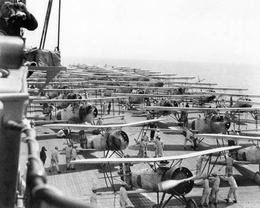 Japan: Imperial Japanese Navy aircraft carrier Kaga conducts air operations in 1937. On the deck are Mitsubishi B2M Type 89, Nakajima A2N Type 90, and Aichi D1A1 Type 94 aircraft, 11 May 1937 Kaga was an aircraft carrier built for the Imperial Japanese Navy (IJN) and was named after the former Kaga Province in present-day Ishikawa Prefecture. Originally intended to be one of two Tosa-class battleships, Kaga was converted under the terms of the Washington Naval Treaty to an aircraft carrier as the replacement for the battlecruiser Amagi, which had been damaged during the 1923 Great Kanto earthquake. Kaga was rebuilt in 1933 35, increasing her top speed, improving her exhaust systems, and adapting her flight decks to more modern, heavier ai Copyright: xxPicturesxFromxHistoryx