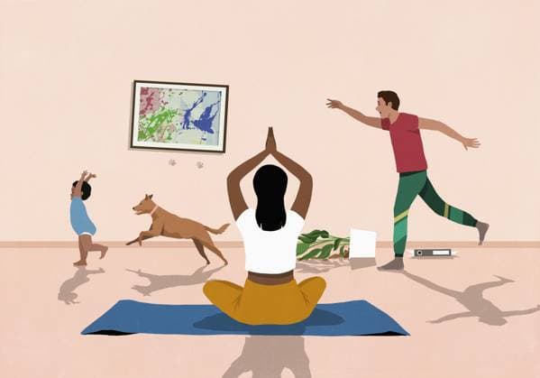 Woman meditating on yoga mat in living room while husband chases baby and dog  Copyright: MaltexMueller fStopImages2070104