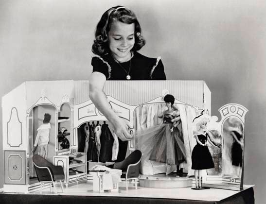 RECORD DATE NOT STATED Barbie Doll Fashion Shop New York, New York, March, 1963 Mattel s Barbie doll now has her own fashion shop, which was introduced at the New York Toy Fair by Mattel, Inc., creators of the famed Barbie doll, where Barbie, Midge, or Fashion Queen Barbie may model their latest fashions. Barbie s own distinctive salon is made of sturdy, four-color lithographed chipboard. It looks just like the most elegant 5th Avenue salon. The custom-designed interior is completely furnished, down to a model s entrance which opens into a backstage dressing room, and a mannequin, display case furnishings, and other realistic accessories. All features of the Barbie Fashion Shop are scaled exactly to Barbie-size. Copyright: Â¬ xUnderwoodxArchives 990_05_3-Hobby-Doll_21HR