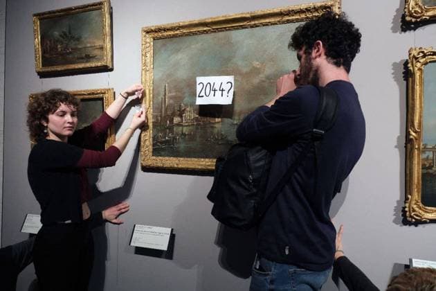Bilder des Jahres 2024, News 04 April News Themen der Woche KW14 News Bilder des Tages LATEST GENERATION blitz at the galleries of the Academy of VENICE in the afternoon in front of Francesco Guardi s painting Bacino di San Marco with the island of San Giorgio and the Giudecca VENICE - LATEST GENERATION non-violent action, Blitz at the galleries of the VENICE academy in the afternoon in front of Francesco Guardi s painting Bacino di San Marco with the island of San Giorgio and the Giudecca , with a transparent thread they suspended a sign with 2044 written, then they sat down unrolling the banner reading Reparation Fund Editorial Usage Only VENICE Italy  Copyright: xIPA ABACAx