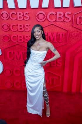 April 7, 2024, Austin, Tx, United States: Country singer GLORILLA walks the red carpet and poses for photographs prior to the CMT Music Awards show at Austin s Moody Center on April 6, 2024. Austin United States - ZUMAd150 20240407_znp_d150_049 Copyright: xBobxDaemmrichx