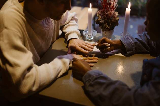 High angle view of couple playing while sitting at table during date in restaurant Germany, Berlin, model released, property released Copyright: xMaskotx , MA108409 MA108409