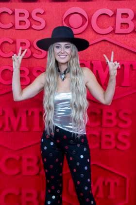 April 7, 2024, Austin, Tx, United States: Country singer LAINEY WILSON walks the red carpet and poses for photographs prior to the CMT Music Awards show at Austin s Moody Center on April 6, 2024. Austin United States - ZUMAd150 20240407_znp_d150_069 Copyright: xBobxDaemmrichx