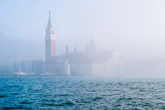 Island and church San Giorgio di Maggiore, shrouded in mist, seen across the Canale della Giudecca. Venice Veneto Italy FB_2024_0653