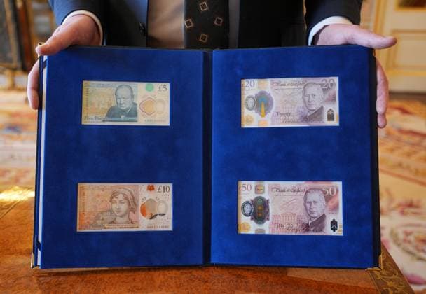 . 09 04 2024. London, United Kingdom. King Charles III is presented with the first bank notes featuring his portrait at Buckingham Palace in London.  xPoolx xi-Imagesx IIM-25110-0012