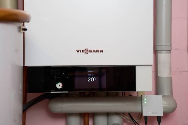 Augsburg, Bavaria, Germany - April 13, 2024: Gas heating, gas boiler model Viessmann Vitodens 300 in the basement of a residential building *** Gasheizung, Gastherme Model Viessmann Vitodens 300 in dem Keller eines Wohnhauses