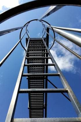 Creative Highlights World The metal stairs ascend from the iron framework into the sky 8767799 RECORD DATE NOT STATED