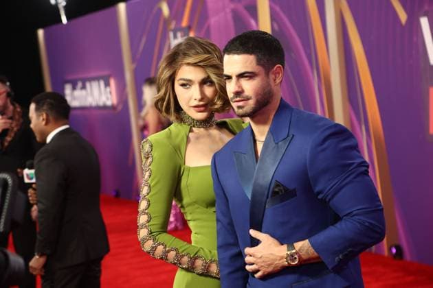 Migbelis Castellanos (L) and Roberto Hernandez arrive for the 2024 Latin American Music Awards at the Grand Garden Arena at MGM Resort and Casino in Las Vegas, Nevada on Thursday, April 25, 2024.  LAV20240425011 JAMESxATOA