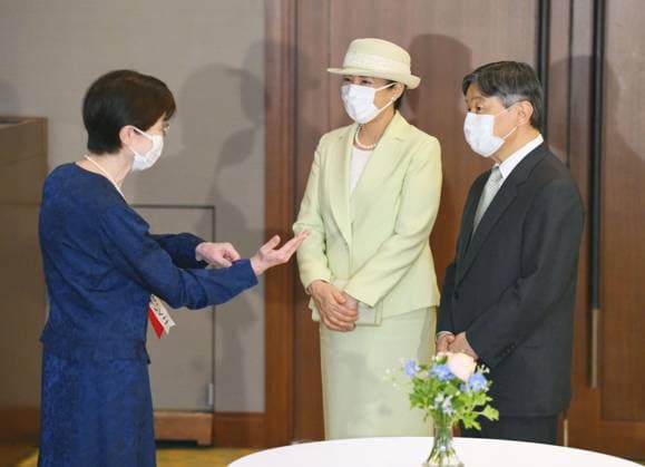 Japan s emperor at award ceremony Japanese Emperor Naruhito (R) and Empress Masako talk with an awardee (L) after a commendation ceremony in Tokyo on April 26, 2024, held for people who have contributed to the promotion of greenery and forestry.  A14AA0002755332P