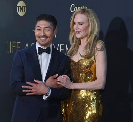 Nicole Kidman and Brian Tee attend the 49th AFI Lifetime Achievement Award tribute gala honoring Kidman at the Dolby Theatre in the Hollywood section of Los Angeles on Saturday, April 27, 2024.  LAP2024042735 JIMxRUYMEN