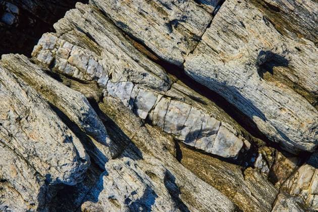 Detail of rocks from above with large section of mineral quartz vein Image of Detail of rocks from above with large section of mineral quartz vein Copyright: x RECORD DATE NOT STATED