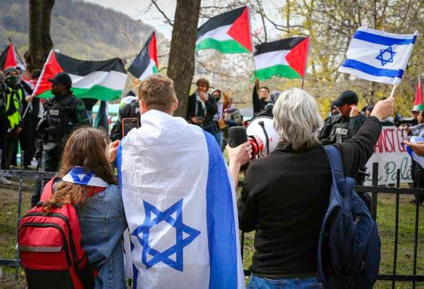 May 2, 2024, Montreal, Quebec, Canada: Two opposing protests faced off outside McGill University in downtown Montreal Thursday afternoon, where a pro-Palestinian encampment set up on Saturday remains in place.The students in the encampment are demanding McGill divest from companies with business ties to Israel. Montreal Canada - ZUMAs278 20240502_zip_s278_019 Copyright: xSerkanxSenturkx