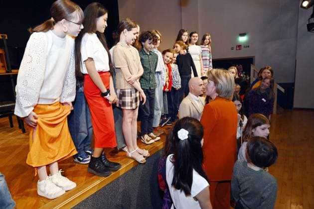 Queen Mathilde of Belgium and Students pose for the photographer during a visit to the music academy in Anderlecht, Brussels on Friday 03 May 2024.  ERICxLALMAND 91998954