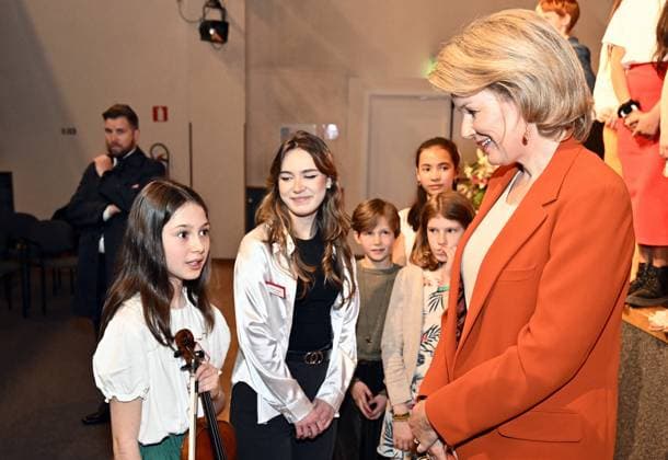 Violinist Georgia Koumentakou (L) and Queen Mathilde of Belgium pictured during a visit to the music academy in Anderlecht, Brussels on Friday 03 May 2024.  ERICxLALMAND 91998958
