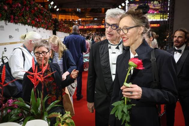 German Film Award 2024 Wim Wenders and Donata Wenders take flowers with them at the party at the Lola German Film Award 2024 ceremony at the Theater am Potsdamer Platz in Berlin Date 03 05 2024 Copyright: xEventpressx