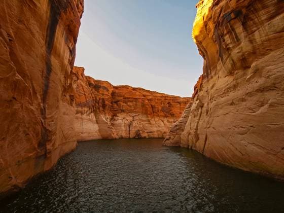 Creative Highlights World Beautiful canyon and lonely rocks on the Lake Powell Lake Powell is based on Colorado River with a great view on the canyoon. Beautiful canyon and lonely rocks on the Lake Powell, Utah. Copyright: xZoonar.com DmitryixBogdanovx 21596311