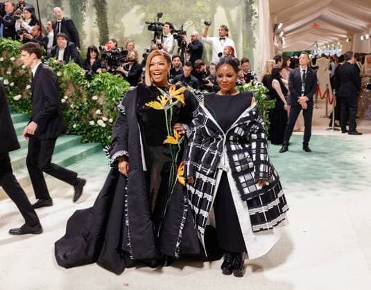 Eboni Nichols and Queen Latifah arrive on the red carpet at the 2024 Met Gala celebrating Sleeping Beauties: Reawakening Fashion at The Metropolitan Museum of Art on Monday, May 6, 2024 in New York City.  NYP20240506278 JOHNxANGELILLO
