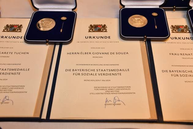 Certificate from Giovane Elber Award of the Bavarian State Medal for Social Merit 2024 Heilige Hofkirche Munich 07 May 2024