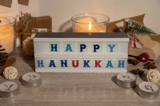 Candles with advent calendar Lightbox with text HAPPY HANUKKAH Traditional Burning Christmas Wax Candles with numbers counting down for Christmas. Beautiful Advent At Home. Festive Candlelight And Dark Background Candles with advent calendar Lightbox with text HAPPY HANUKKAH Traditional Burning Christmas Wax Candles with numbers counting down for Christmas. Beautiful Advent At Home. Festive Candlelight And Dark Background. Christmas eve Copyright: x RECORD DATE NOT STATED