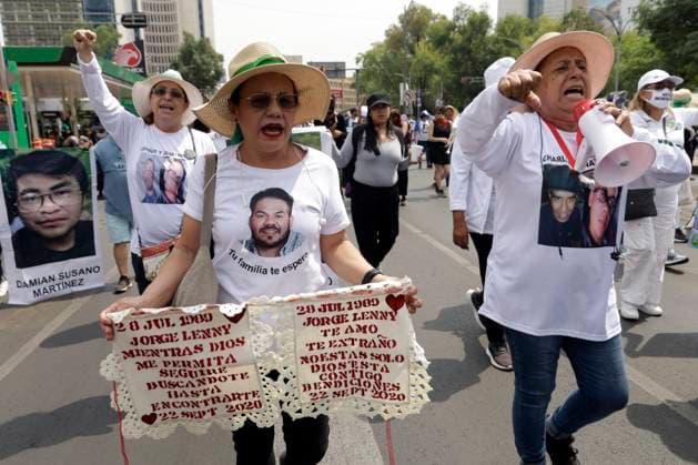 Mothers and relatives of disappeared people wearing t-shirts with a photo of their loved ones take part during a protest on Mother s Day to demand that the government clarify the disappearances at Monument to the Mother course to the National Palace at Zocalo Square. Mexico City Mexico - ZUMAe321 20240510_zia_e321_003 Copyright: xLuisxBarronx