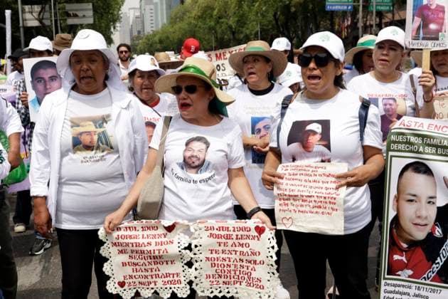 Mothers and relatives of disappeared people wearing t-shirts with a photo of their loved ones take part during a protest on Mother s Day to demand that the government clarify the disappearances at Monument to the Mother course to the National Palace at Zocalo Square. Mexico City Mexico - ZUMAe321 20240510_zia_e321_008 Copyright: xLuisxBarronx