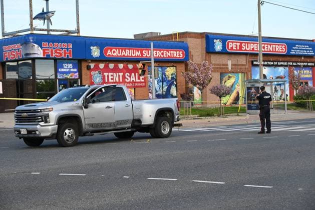 May 12, 2024, Scarborough, Toronto, Ontario, Canada: Tow truck involved in a shooting where one person was injured in Scarborough. At approximately 4:54 p.m., Sunday afternoon police responded to the area of Kennedy Rd and Munham Gate for a driver shooting from a vehicle to a tow truck. Toronto police say that they located a victim suffering from gunshot wounds, the victim was transported to the hospital with non-life-threatening injuries. Police are actively searching for a suspect. This is the third shooting in the District of Scarborough involving a tow truck in less than 24 hours. Scarborough, Toronto Canada - ZUMAs197 20240512_aaa_s197_355 Copyright: xKylexMazzax