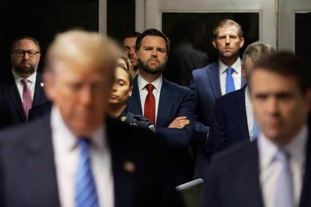 Sen. JD Vance, R-OH, watches as former President Donald Trump speaks to reporters at Manhattan criminal court in New York on Monday, May 13, 2024. Michael Cohen, a one-time fixer and personal attorney to Trump, will take the stand today to begin testifying in the hush-money criminal trial against the former president. Pool photo by Sarah Yenesel  NYP20240513753 SarahxYenesel