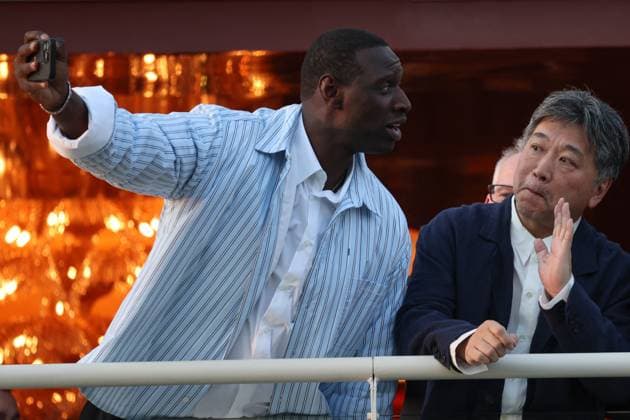 Cannes - Jury Dinner Ahead Of The Festival Opening Omar Sy, Hirokazu Kore-eda attend a dinner ahead of the 77th Cannes Film Festival on May 13, 2024 in Cannes, France. Photo by Shootpix ABACAPRESS.COM Cannes France  Copyright: xShootpix ABACAx