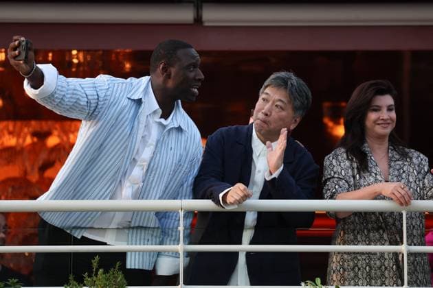 Cannes - Jury Dinner Ahead Of The Festival Opening Omar Sy, Hirokazu Kore-eda attend a dinner ahead of the 77th Cannes Film Festival on May 13, 2024 in Cannes, France. Photo by Shootpix ABACAPRESS.COM Cannes France  Copyright: xShootpix ABACAx