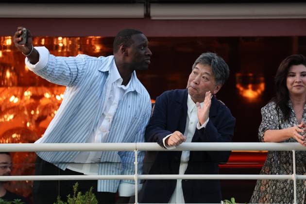 Cannes - Jury Dinner Ahead Of The Festival Opening Omar Sy, Hirokazu Kore-eda attend a dinner ahead of the 77th Cannes Film Festival on May 13, 2024 in Cannes, France. Photo by Shootpix ABACAPRESS.COM Cannes France  Copyright: xShootpix ABACAx