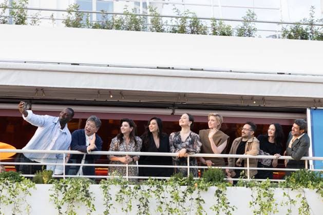 Cannes - Jury Dinner Ahead Of The Festival Opening Members of the Jury the 77th edition of the Cannes Film Festival French actor and comedian Omar Sy take a selfie with Japanese director Kore-eda Hirokazu, Turkish actress and screenwriter Ebru Ceylan, Lebanese director Nadine Labaki, US actress Lily Gladstone, US director and president of the Jury of the 77th Cannes Film Festival Greta Gerwig, Spanish director, producer, and writer Juan Antonio Bayona, French actress Eva Green and Italian actor Pierfrancesco Favino during a dinner of the jury at the Grand Hyatt Cannes Hotel Martinez, on the eve of the opening ceremony of the 77th edition of the Cannes Film Festival. The 77th Cannes Film Festival on May 13, 2024 in Cannes, France. Photo by S Copyright: xShootpix ABACAx