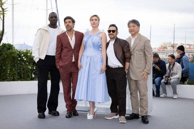 Cannes - Jury Photocall Jury Members Omar Sy, Pierfrancesco Favino, President of the Jury Greta Gerwig, Juan Antonio Bayona, and Hirokazu Kore-eda attend the jury photocall at the 77th annual Cannes Film Festival at Palais des Festivals on May 14, 2024 in Cannes, France Photo by Shootpix ABACAPRESS.COM Cannes France  Copyright: xShootpix ABACAx