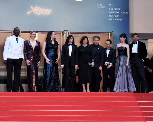 Cannes, 77th Cannes Film Festival 2024, Red carpet Opening Ceremony and film Le Deuxieme Acte In the photo: Omar Sy, Greta Gerwig, Lily Gladstone, Nadine Labaki, Hirokazu Kore-eda, Ebru Ceylan, Juan Antonio Bayona, Eva Green, Pierfrancesco Favino Copyright: xAlbertoxTerenghix xipa-agency.nex xPoolxPhotoxEventsx03x IPA_Agency_IPA46059943