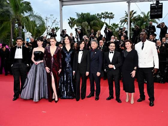 Cannes, 77th Cannes Film Festival 2024 - opening red carpet and the film Le Deuxieme Acte. In the photo Pierfrancesco Favino, Eva Green, the president of the jury Greta Gerwig, the members Lily Gladstone, Nadine Labaki, Hirokazu Kore-eda, Juan Antonio Bayona, Ebru Ceylan and Omar Sy  Copyright: xSimonexComix xipa-agency.netx xPoolxPhotoxEventsx03x IPA_Agency_IPA46064448
