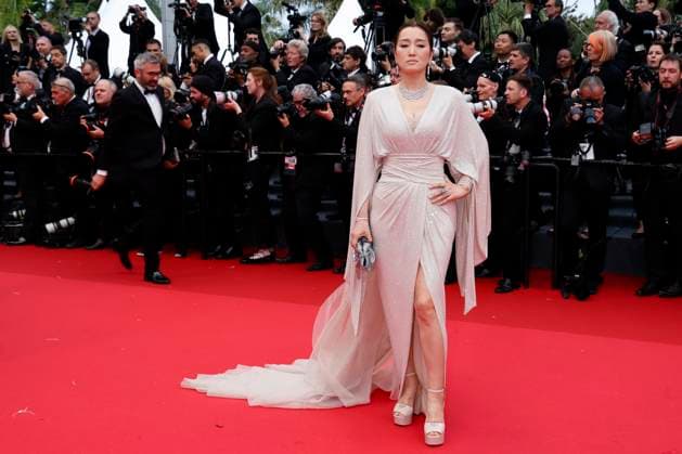 May 14, 2024: Gong Li attends the premiere of Le Deuxieme Acte ( The Second Act ) and opening ceremony of the 77th Cannes Film Festival at Palais des Festivals in Cannes, France, on 14 May 2024. Photo: - ZUMAm179 20240514_zep_m179_041 Copyright: xAlecxMichaelx