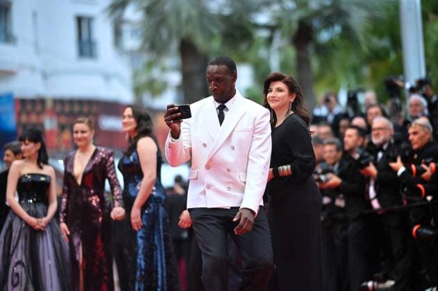Cannes - Opening Ceremony Arrivals Omar Sy attends Le Deuxieme Acte The Second Act Screening opening ceremony red carpet at the 77th annual Cannes Film Festival at Palais des Festivals on May 14, 2024 in Cannes, France. Photo by Franck Castel ABACAPRESS.COM Cannes France  Copyright: xCastelxFranck ABACAx