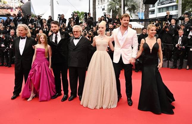 British actress Anya Taylor- Joy, producer Doug Mitchell, actor Tom Burke, Australian director George Miller, actress Alyla Browne, actor Chris Hemsworth and Spanish actress Elsa Pataky attend the premiere of Furiosa: A Mad Max Saga at the 77th Cannes Film Festival in Cannes, France on Wednesday, May 15, 2024.  CAN20240515162 RUNExHELLESTAD
