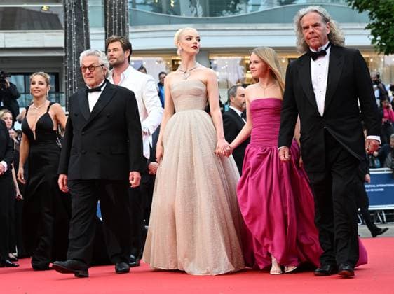 British actress Anya Taylor- Joy, producer Doug Mitchell, Australian director George Miller, actress Alyla Browne, actor Chris Hemsworth and Spanish actress Elsa Pataky attend the premiere of Furiosa: A Mad Max Saga at the 77th Cannes Film Festival in Cannes, France on Wednesday, May 15, 2024.  CAN20240515167 RUNExHELLESTAD