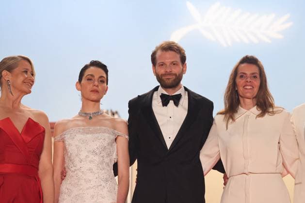 J MontÃ e des marches du film Â The girl with the needle La jeune femme Ã laiguille Â lors du 77eme Festival International du Film de Cannes Trine Dyrholm, Vic Carmen Sonne, Magnus von Horn, Malene Blenkov MontÃ e des marches du film Â The girl with the needle La jeune femme Ã laiguille Â lors du 77eme Festival International du Film de Cannes, au Palais des Festivals Ã Cannes On may 15th 2024 Jacovides Moreau Bestimage Red carpet of the movie Â The girl with the needle Â during the 77th Cannes International Film Festival at the Palais des Festivals in Cannes, France On may 15th 2024 Cannes France  Copyright: xJACOVIDES-MOREAUx xBESTIMAGExJACOVIDES-MOREAUx xBESTIMAGEx