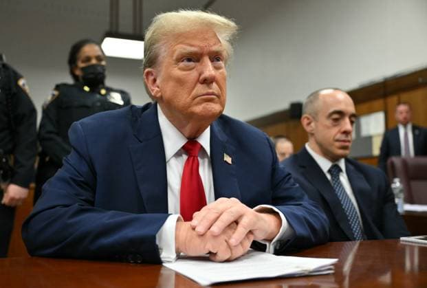 Former President Donald Trump waits for his trial to begin at Manhattan Criminal Court in New York on Thursday, May 16, 2024. Michael Cohen, a one-time fixer and personal attorney to Trump, is expected to continue testifying in the hush-money criminal trial against the former president. Pool photo by Angela Weiss  NYP20240516709 AngelaxWeiss
