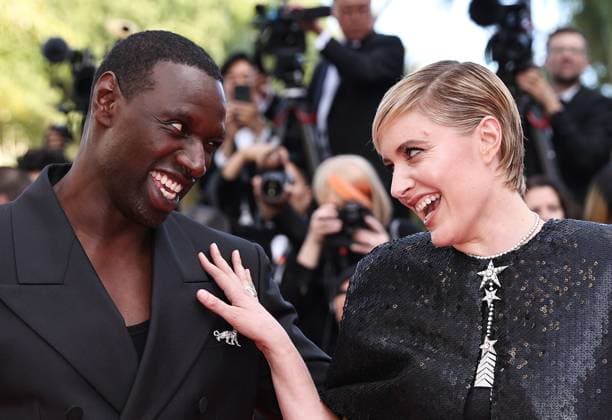 Entertainment Bilder des Tages (240517) -- CANNES, May 17, 2024 -- U.S. director and president of the Jury of the 77th Cannes Film Festival Greta Gerwig (R) and French actor and member of the Jury Omar Sy arrive for the screening of the film Megalopolis at the festival in Cannes, southern France, on May 16, 2024. ) FRANCE-CANNES-FILM FESTIVAL- MEGALOPOLIS GaoxJing 
