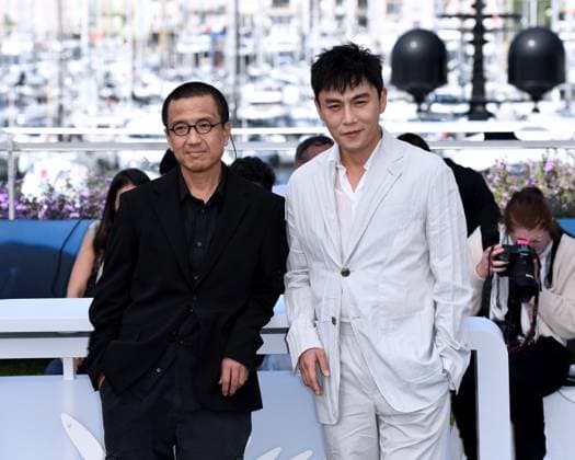 Cannes, 77th Cannes Film Festival 2024, Red carpet film An Unfinished Film Pictured: Qin Hao, Lou Ye  Copyright: xAlbertoxTerenghix xipa-agency.nex xPoolxPhotoxEventsx03x IPA_Agency_IPA46171932