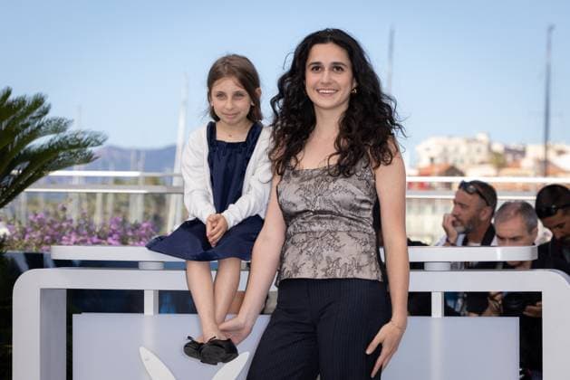 Cannes - Vingt Dieux Photocall Luna Garret and Director Louise Courvoisier attend the Vingt Dieux (Holy Cow) Photocall at the 77th annual Cannes Film Festival at Palais des Festivals on May 17, 2024 in Cannes, France Photo by Shootpix ABACAPRESS.COM Cannes France  Copyright: xShootpix ABACAx
