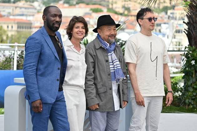 Cannes 2024 Photocall Meeting With Pol Pot Cyril GueÃ¯, Irene Jacob, Rithy Panh, Gregoire Colin at the photocall of Meeting With Pol Pot during the 77th Cannes Film Festival in Cannes, France on May 17, 2024. Photo by Julien Reynaud APS-Medias ABACAPRESS.COM Cannes France  Copyright: xReynaudxJulien APS-Medias ABACAx