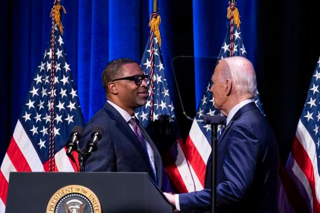 Derrick Johnson, president of the NAACP, greets President Joe Biden at the National Museum of African American History and Culture in Washington, DC, US, on Friday, May 17, 2024. President Biden delivered remarks at the NAACP event marking the anniversary of Brown v. Board of Education at the Museum.  WAX20240517813 AlxDrago
