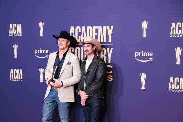 May 16, 2024, Frisco, Tx, USA: Parker McCollum and Dustin Haney, winners of the Visual Media of the Year award for Burn It Down,Ã¢â‚¬Â pose in the press room during the 59th Academy of Country Music Awards at The Ford Center at The Star on May 16, 2024 in Frisco, Texas. Frisco USA - ZUMAs181 20240516_zea_s181_423 Copyright: xOzziexBx