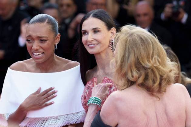 Cannes, France 17th May, 2024 Sophie Wilde, Caroline Scheufele and Demi Moore attends Kinds of Kindness Screening red carpet at the 77th annual Cannes Film Festival at Palais des Festivals on May 17, 2024 in Cannes, France CINEMA 77eme Festival de Cannes Red Carpet du film Kinds of Kindness 17 05 2024 NorbertScanella Panoramic 